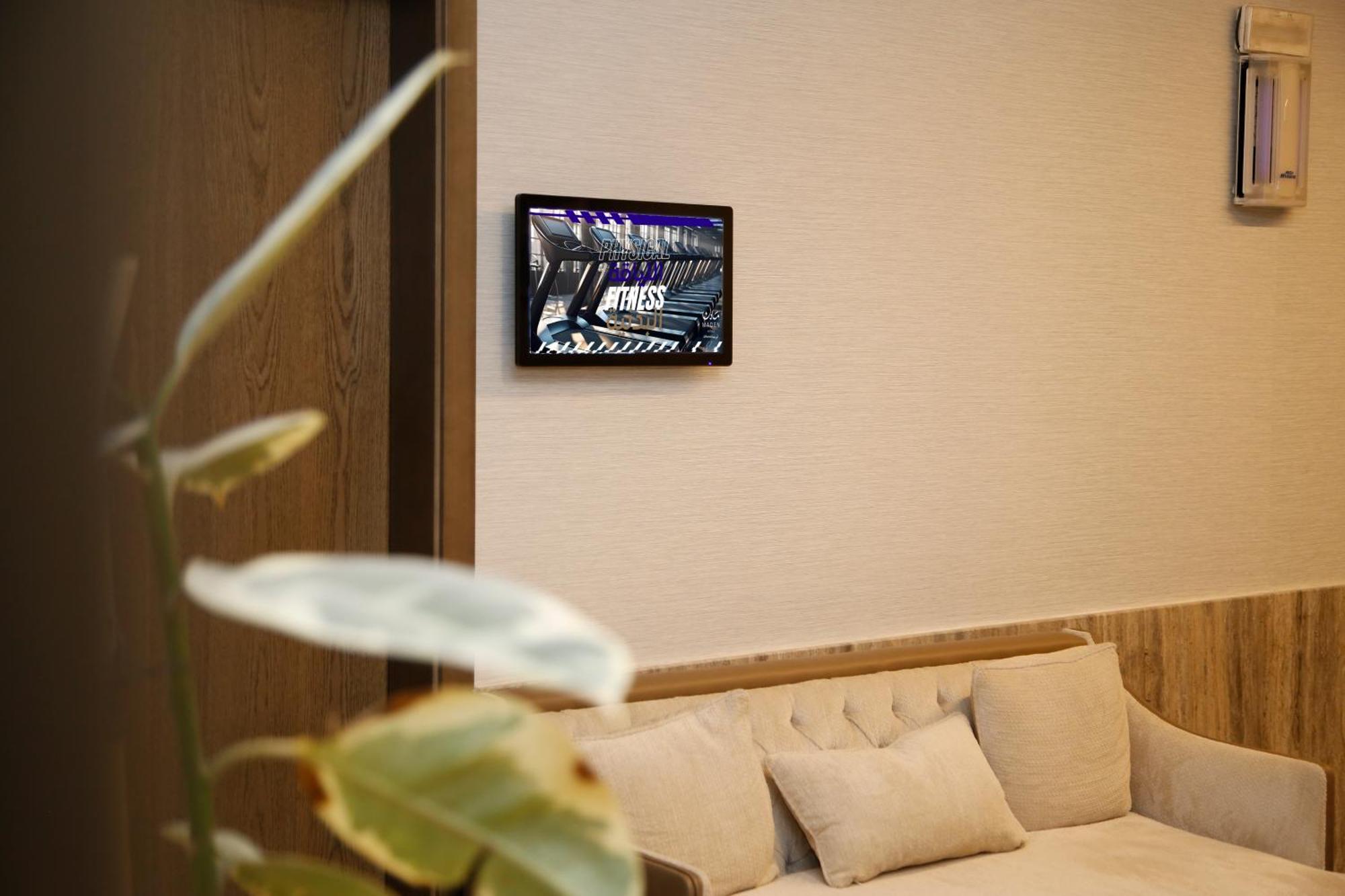 Maden Alrawda Medina Exterior foto A wall-mounted tablet